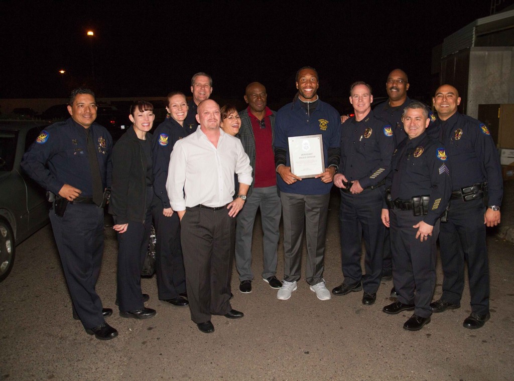 Phoenix Police Chief awards Roy Green and Larry Fitzgerald police chief  for life while David Gergen looks on